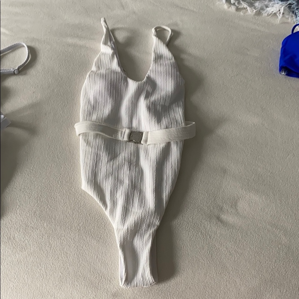 White belted one piece